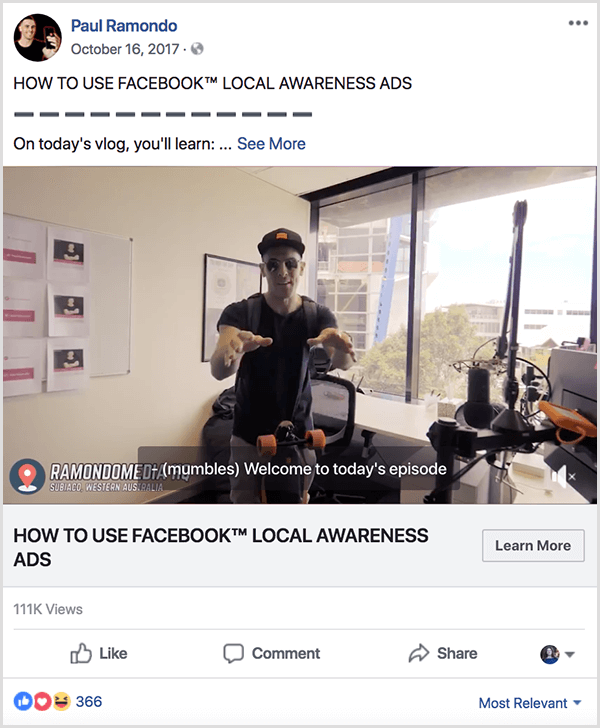 Paul Ramondo vlog auf Facebook hat den Text Wie man Facebook Local Awareness Ads verwendet. Unter diesem Titel befindet sich der Text Im heutigen Vlog, den Sie lernen werden... Das Video zeigt Paul hinter einem L-förmigen Schreibtisch in einem Fensterbüro. Er trägt eine Baseballkappe und ein schwarzes T-Shirt.