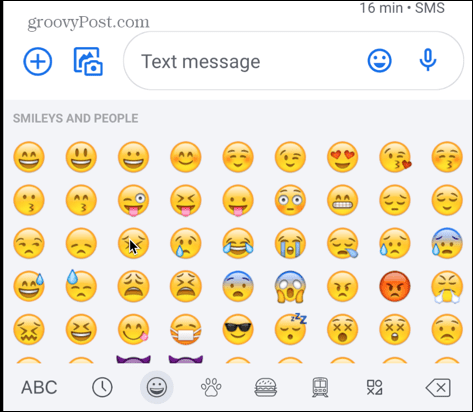 Tastatur-Emojis mit grünem Apfel