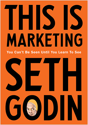 Dies ist ein Screenshot des Covers von This Is Marketing von Seth Godin. Das Cover ist ein vertikales Rechteck mit einem orangefarbenen Hintergrund und schwarzem Text. Ein Foto von Seths Kopf erscheint im O seines Nachnamens.